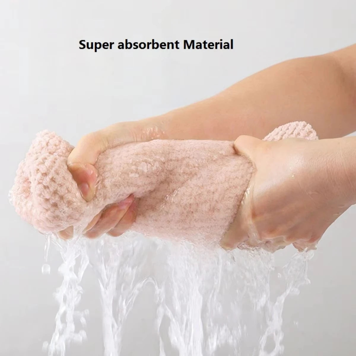 Serviette absorbante pour cheveux avec bouton de maintien